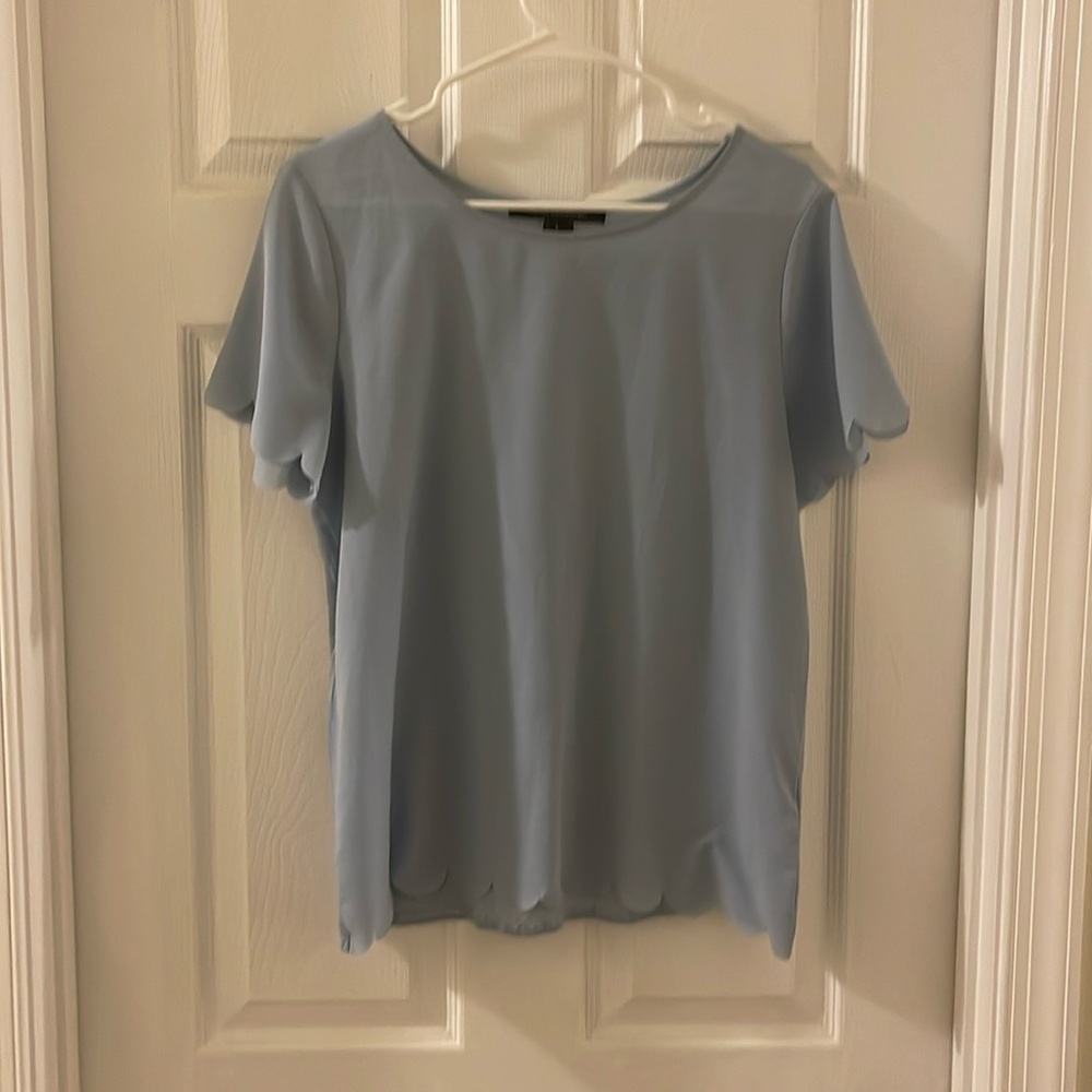Light blue scalloped blouse
